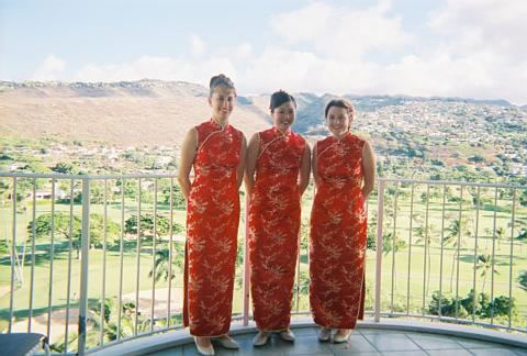 3 bridesmaids wearing Chinese dresses